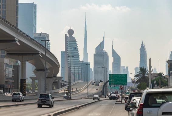 Image of Sheikh Khalifa Bin Zayed Road overlooking the skyscrapers of the Trade Centre district.