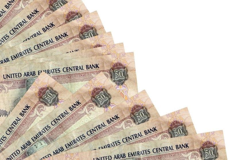50 United Arab Emirates dirham banknote lying on a table.
