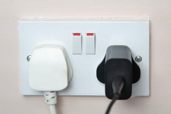 English socket in the wall with switches.