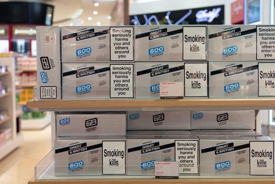 Cigarettes for sale at Dubai International Airport duty-free area.