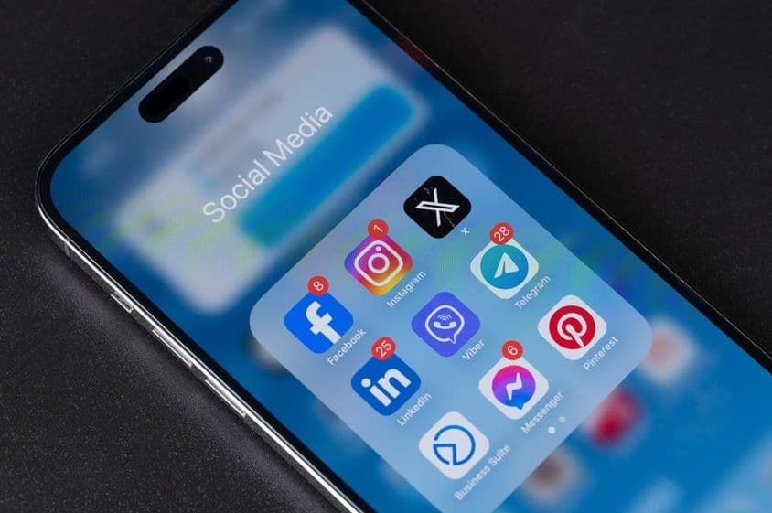 Social media app in iPhone menu on smartphone.