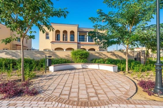 Children's playground and sports area at the Serena Villa community in Dubai Land.