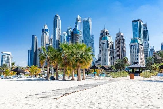 Dubai Jumeirah beach with harbor skyscrapers in the United Arab Emirates.