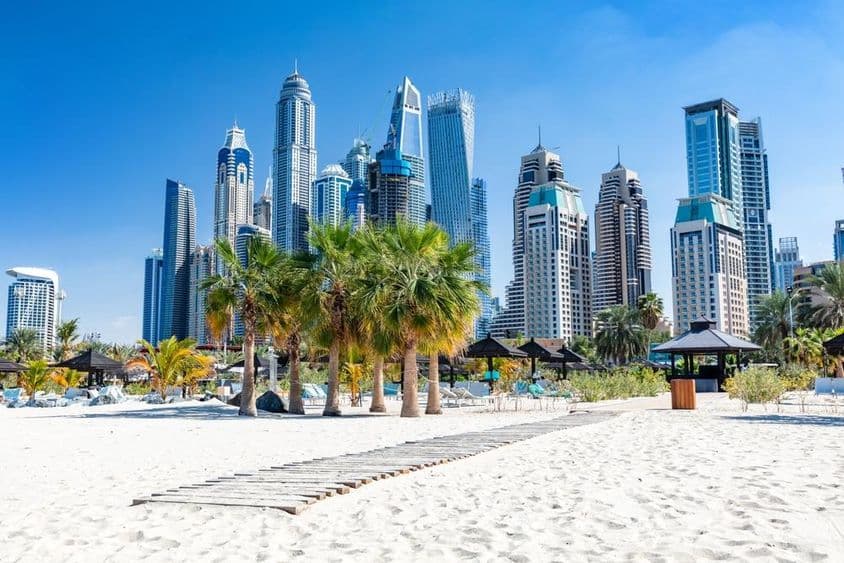 Dubai Jumeirah beach with harbor skyscrapers in the United Arab Emirates.