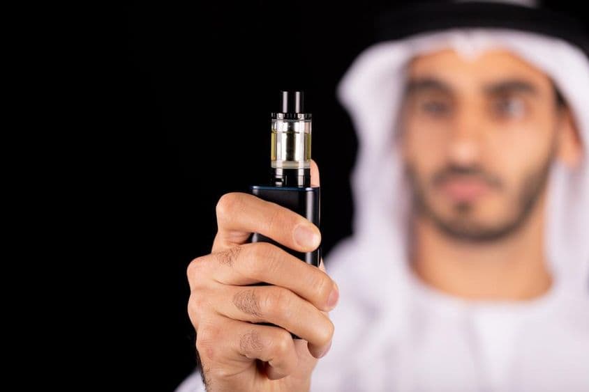 Arab man with an e-cigarette.