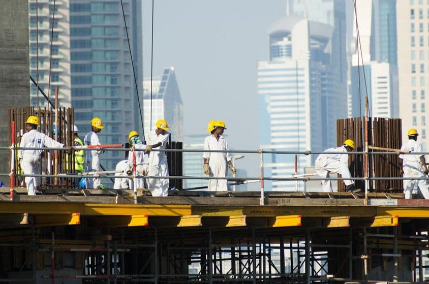 South Asian workers working on the real estate market in Dubai.