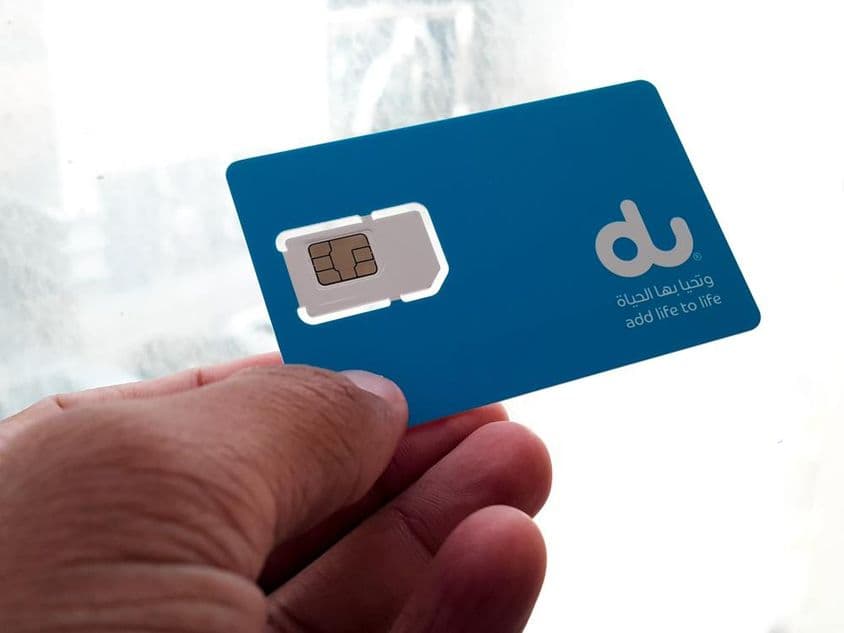 Holding a Dual SIM card.