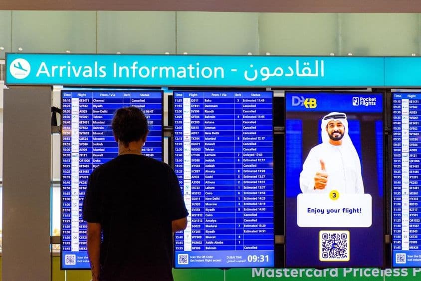 Arrival board at Dubai International Airport.