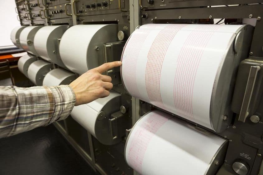 A seismograph records an earthquake on measuring paper.