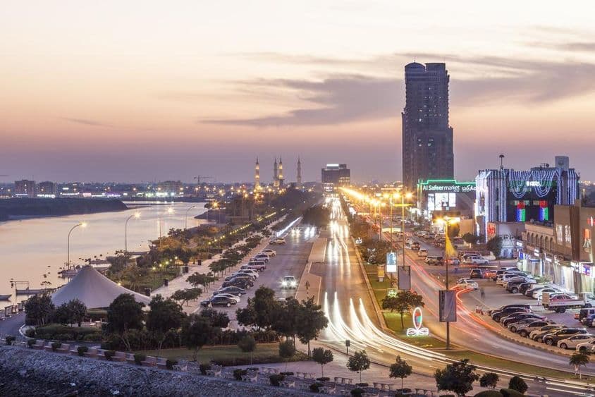 Ras al Khaimah creek and the corniche illuminated at night.