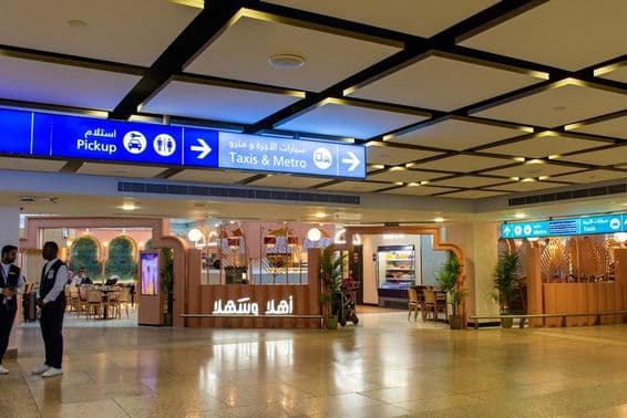 Control screens for taxis and metros at Dubai International Airport.