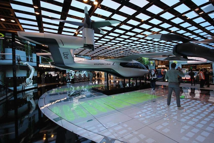 Full-size Hyundai Uber air taxi model displayed at the Etisalat pavilion.