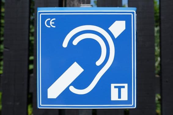 An audio induction loop assisting hearing aid users.