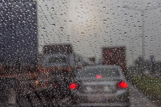 Dubai landscape through a rainy window.