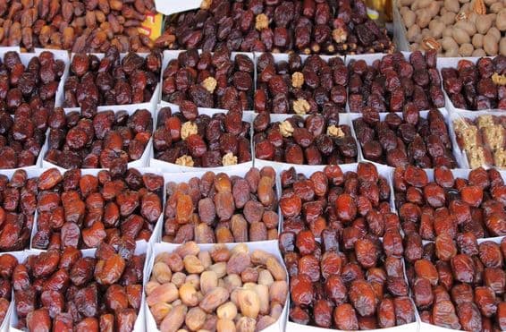 Palm dates on sale at a traditional craft market.