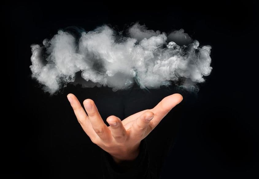 A cloud in a person's hand.