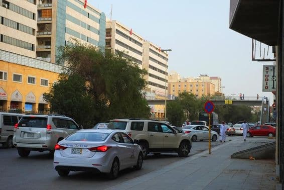 Riyadh, Saudi Arabia traffic along landmarks in Al Batha district.