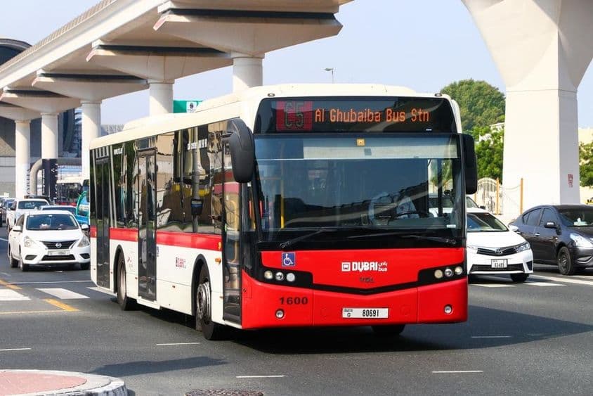 White and red VDL Citea CLF-120.310 on Dubai city streets.