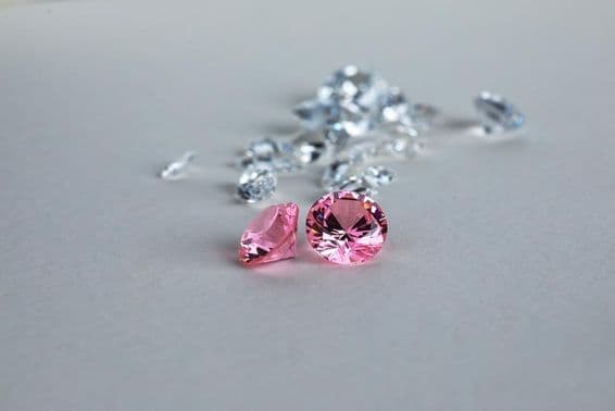 Colorful lab-grown round-cut diamond.