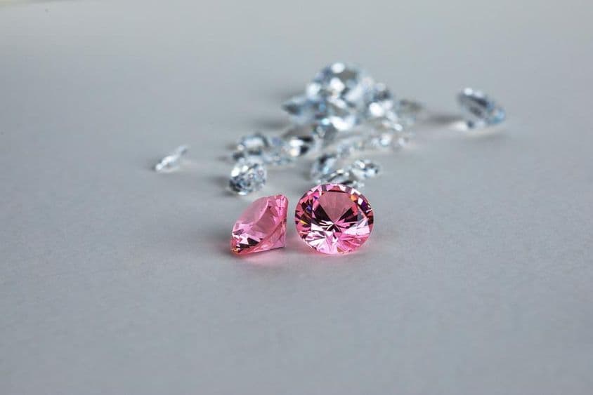 Colorful lab-grown round-cut diamond.