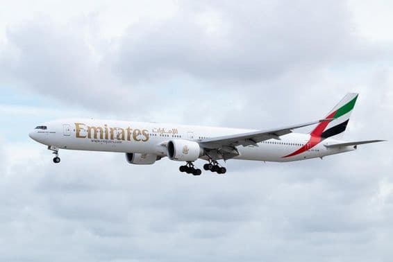 An Emirates Boeing 777-31HER airplane at Miami International Airport.