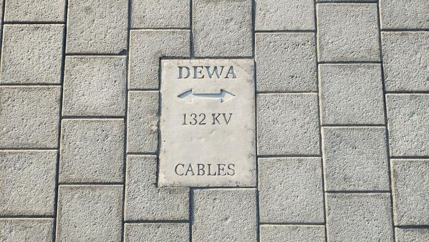 Dubai Electricity and Water Authority warning sign on 132 kV cables.