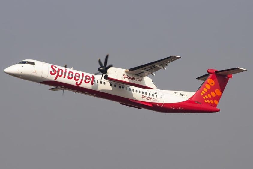 A SpiceJet Bombardier Q400 Dash 8 aircraft takes off from Mumbai airport.