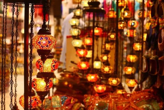 Traditional Arabic hanging lantern in a Dubai street at night.