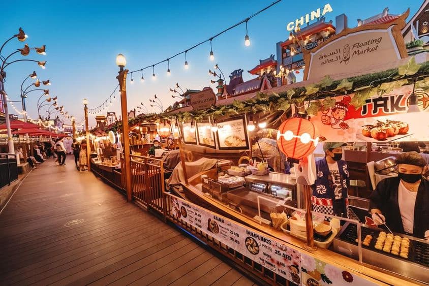 Thai cuisine in a floating restaurant with street food at Global Village in Dubai.