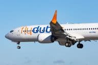 FlyDubai airline Boeing 737-8max aircraft in landing configuration.