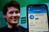 Telegram logo visible in the background with CEO Pavel Durov.