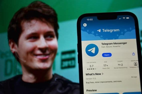 Telegram logo visible in the background with CEO Pavel Durov.