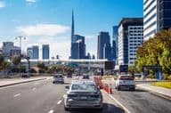 Dubai city taxi on city streets.