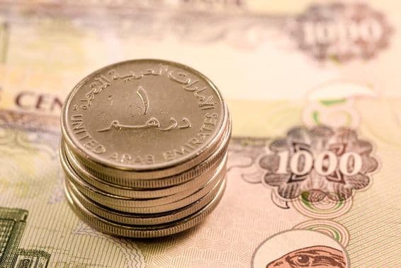 Dirham banknotes and coins.