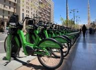 Row of Careem bikes at a docking station.
