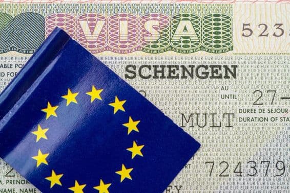 Close-up of a Schengen visa with the EU flag in Berlin.