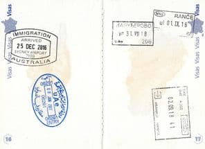 Immigration stamps in a French passport.