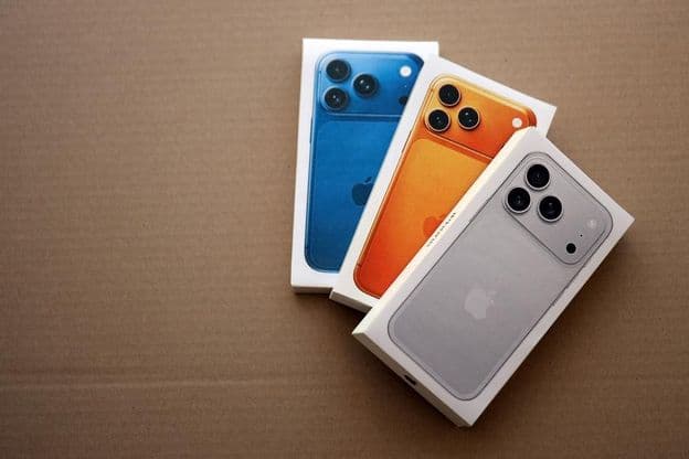 Apple iPhone 17 Pro Max Silver box and other iPhone model boxes.