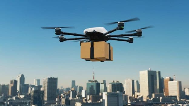Autonomous unmanned aerial vehicle transporting packages.