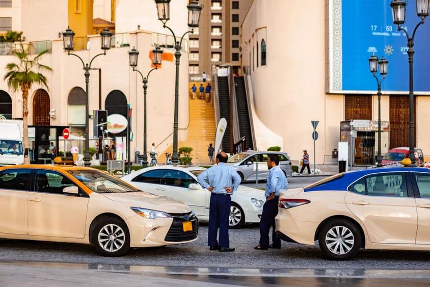 Taxis on a street in Dubai.