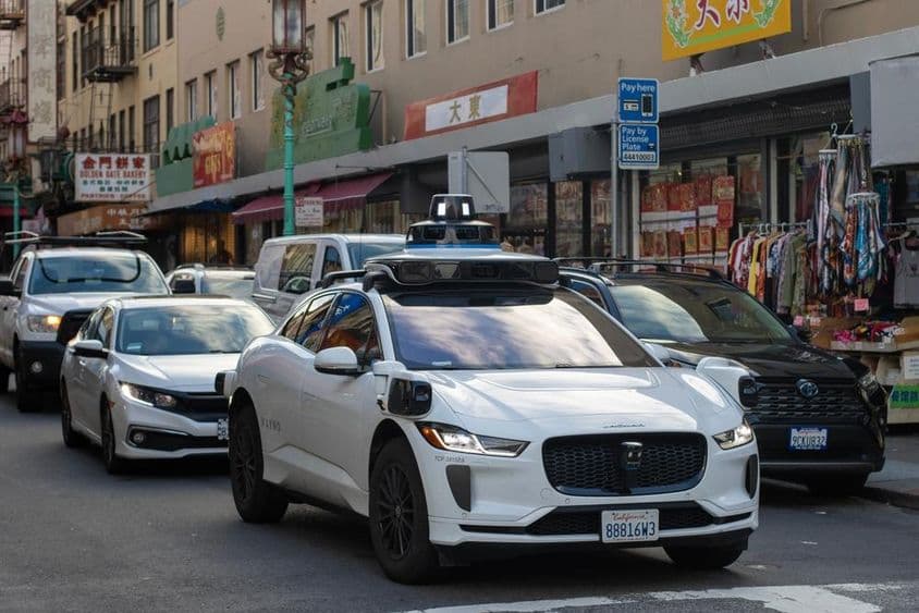 Waymo robotaxi in San Francisco Chinatown.