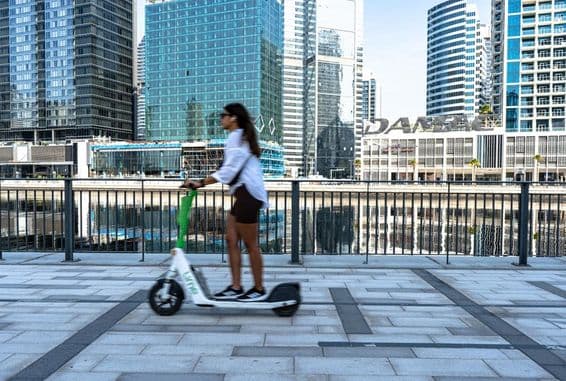 An electric scooter on Dubai Marina promenade.