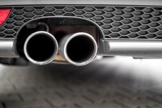An automobile's silver exhaust pipe.