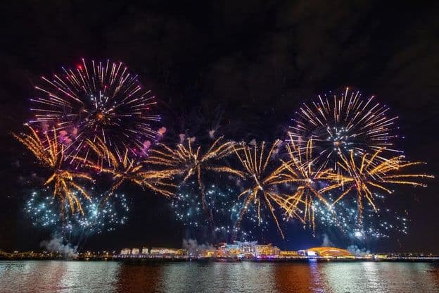 Fireworks over Al Bandar Island with Yas Island view in Abu Dhabi.