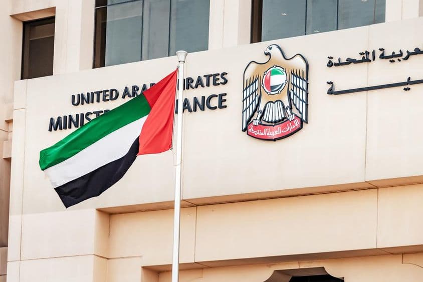 Coat of arms and flag of the UAE Ministry of Finance in Dubai.