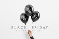 Black Friday sale percentage on black shiny balloon.