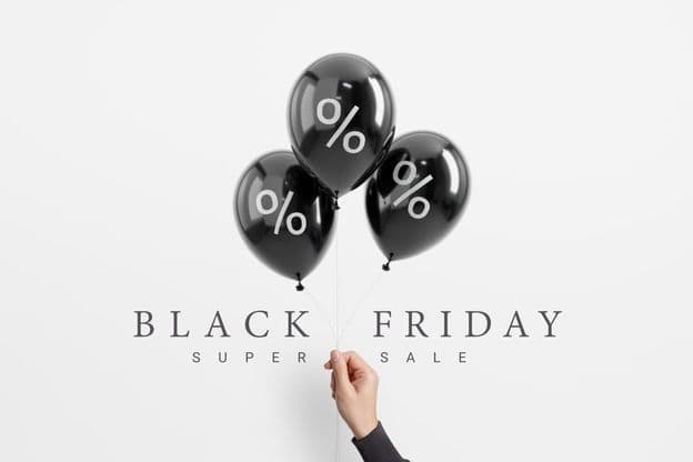 Black Friday sale percentage on black shiny balloon.