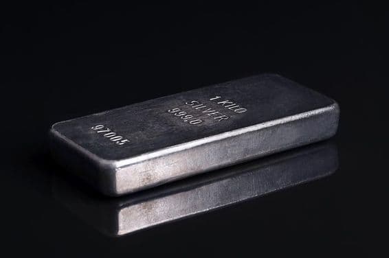Stamped and numbered cast silver ingot, one kilogram.