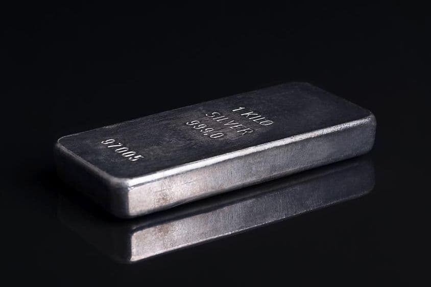 Stamped and numbered cast silver ingot, one kilogram.