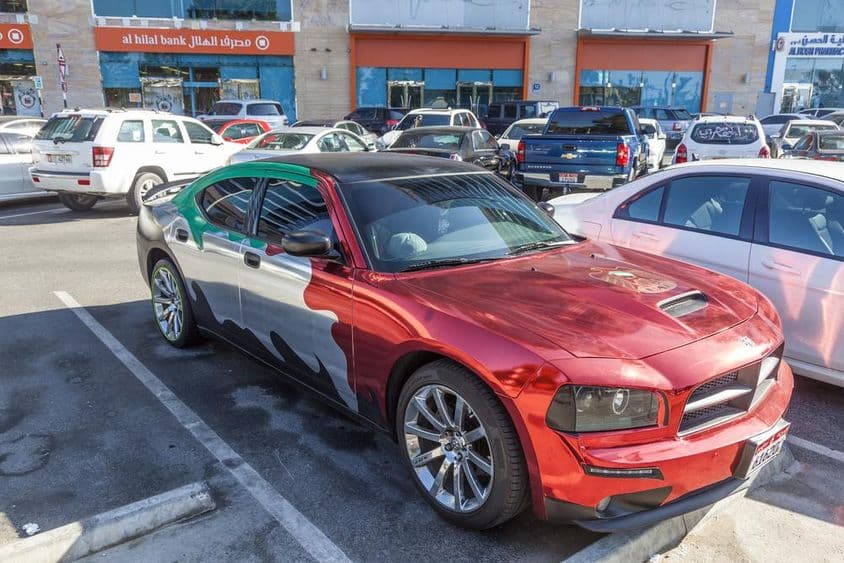 Dodge Charger decorated with the national colors of the United Arab Emirates.